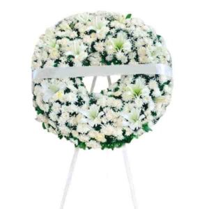 Corona Fúnebre Bella Elegancia en cada pétalo.